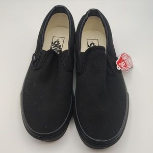 Women’s 7.5 black canvas Vans slides with brown gum sole. Brand new, never worn